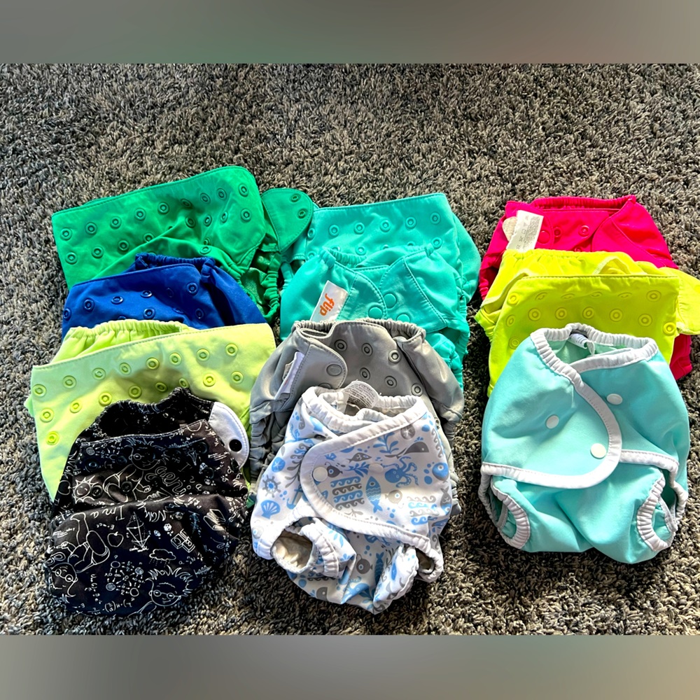 11 cloth diaper covers.